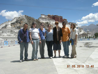 Tibet Tour Organizer Tony and his Clients in front of Potala Palace